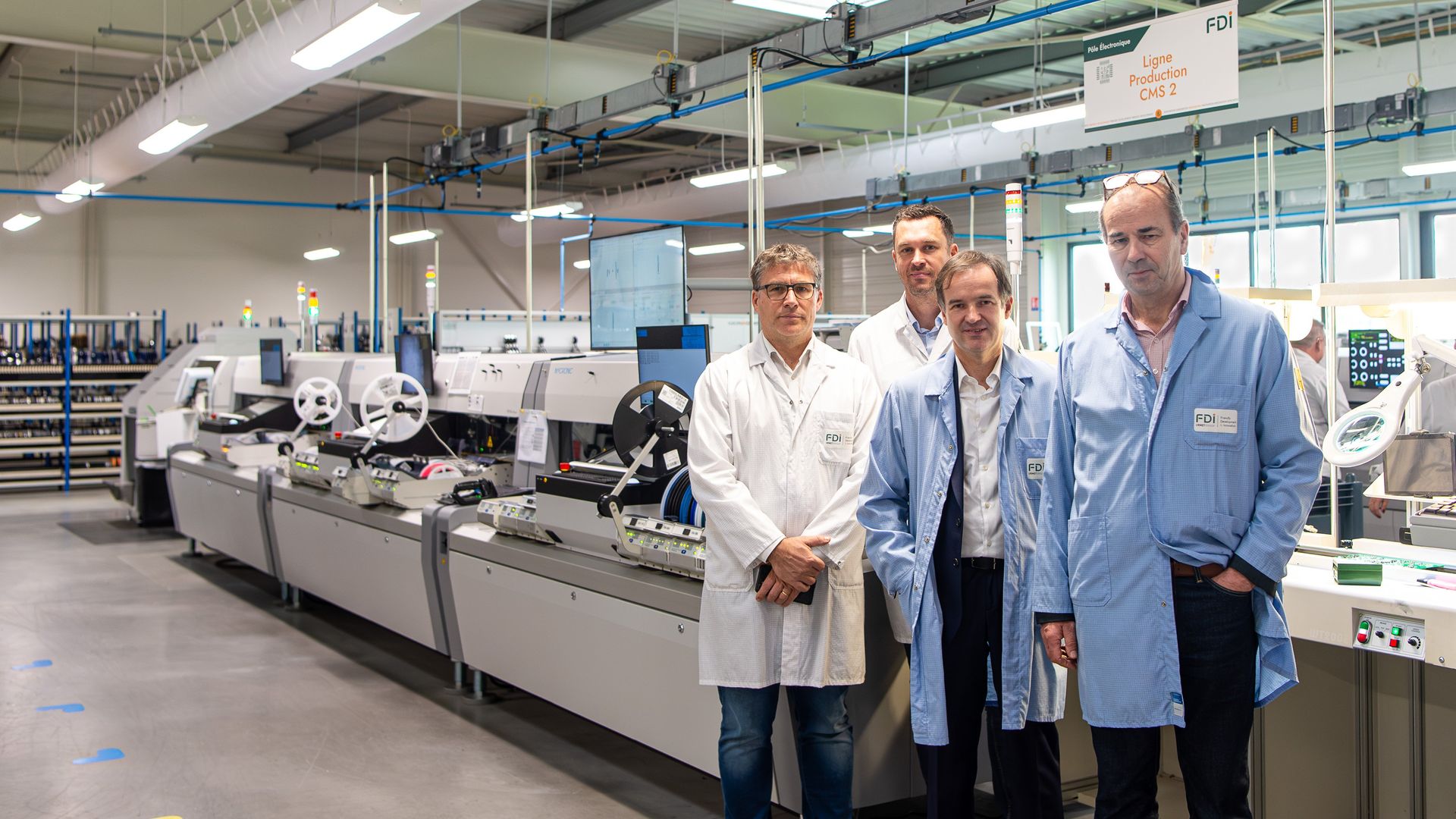 From left to right: Mr. Jean Gautier (FDI Industrial Director), Mr. François LEBON (FDI Production Manager), Mr. Cyrille BIDET (Mycronic General Manager), Mr. Yvon MONOT (Mycronic Sales Engineer).