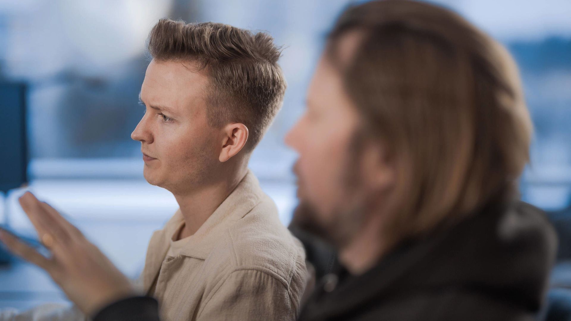 Two men working together