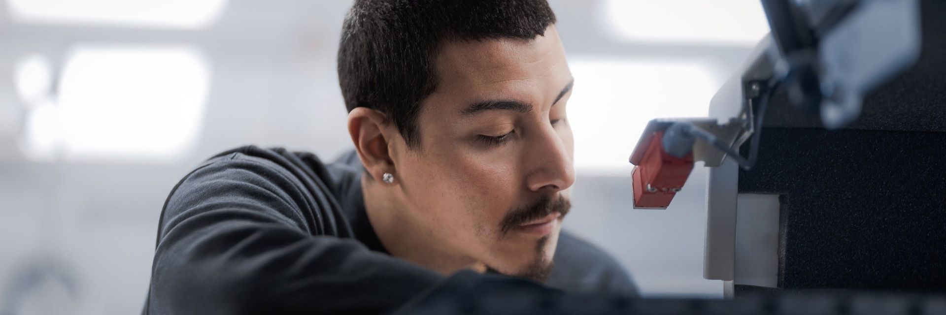 A man working with a machine