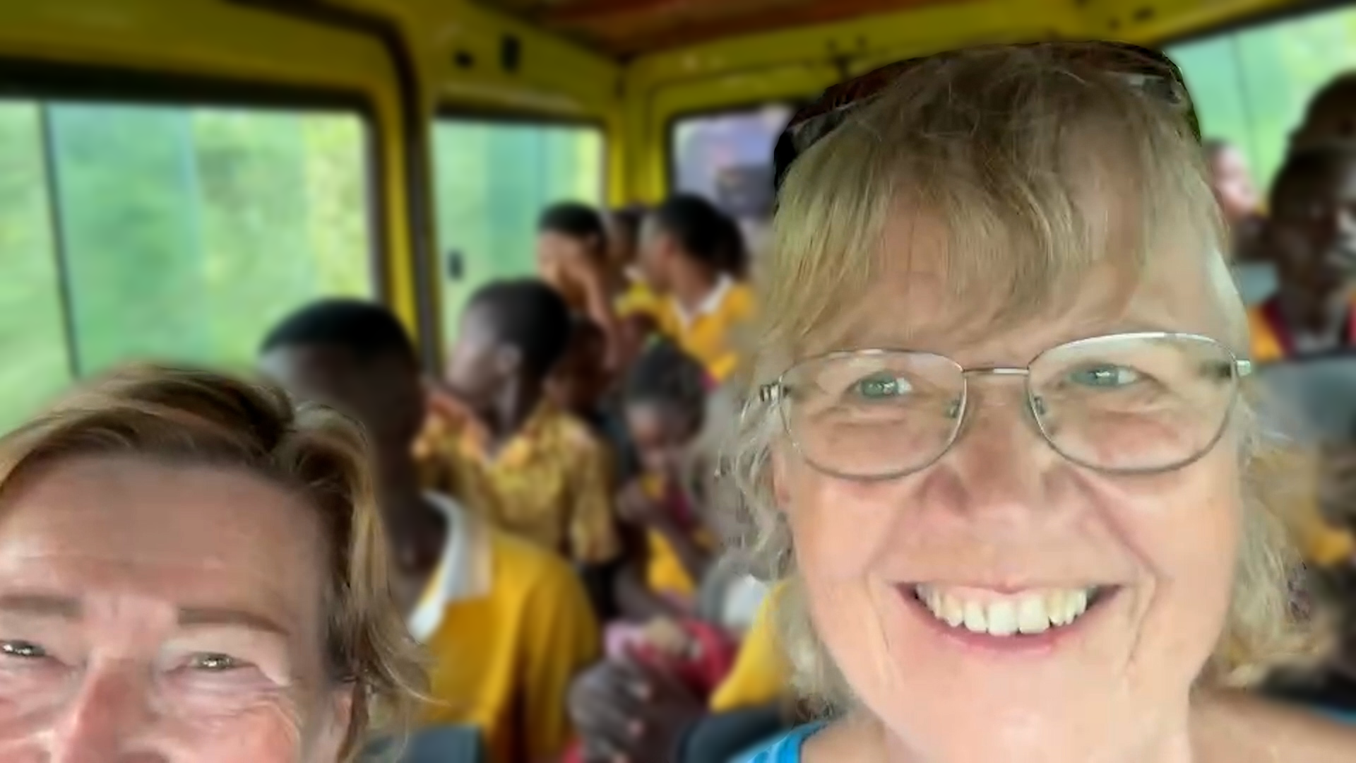 Former employee Eija Engborg in a school bus while visiting Together as one Ghana