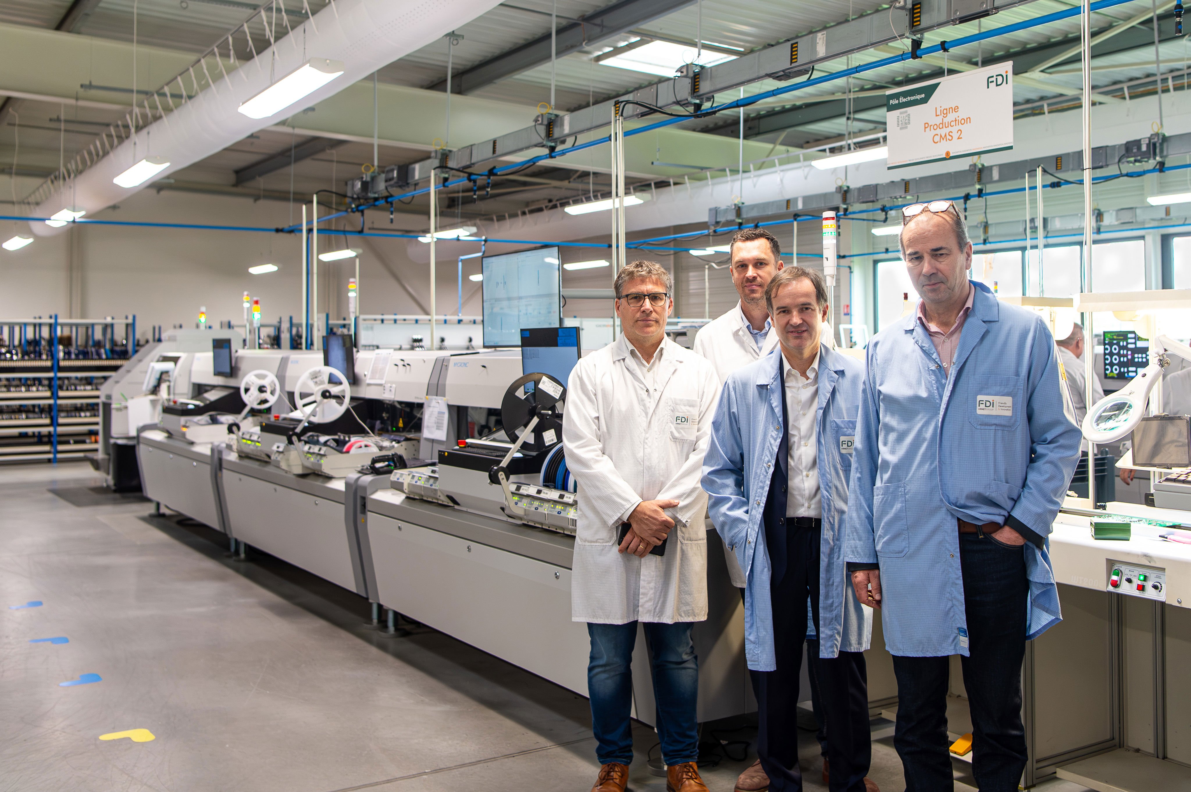 From left to right: Mr. Jean Gautier (FDI Industrial Director), Mr. François LEBON (FDI Production Manager), Mr. Cyrille BIDET (Mycronic General Manager), Mr. Yvon MONOT (Mycronic Sales Engineer).